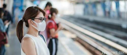 young asian woman wearing protection mask against novel coronavirus 2019 ncov wuhan coronavirus public train station is contagious virus that causes respiratory infection healthcare concept 2