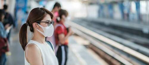young asian woman wearing protection mask against novel coronavirus 2019 ncov wuhan coronavirus public train station is contagious virus that causes respiratory infection healthcare concept 1